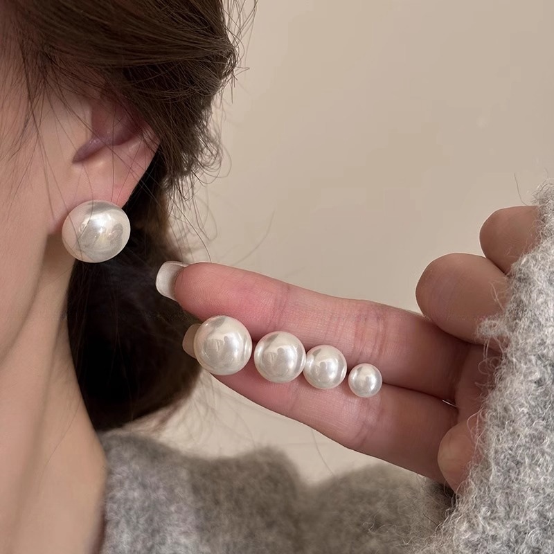 Pendientes de perlas elípticas - Coffee Tea Or Me reseña y precio